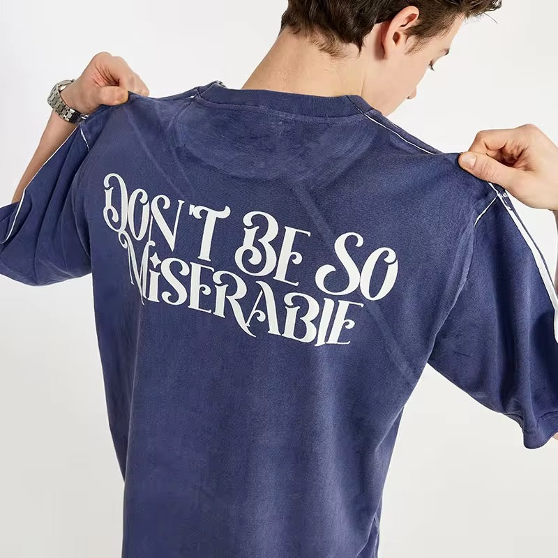 “Don’t Be So Miserable” T-Shirt ANJE REBEL